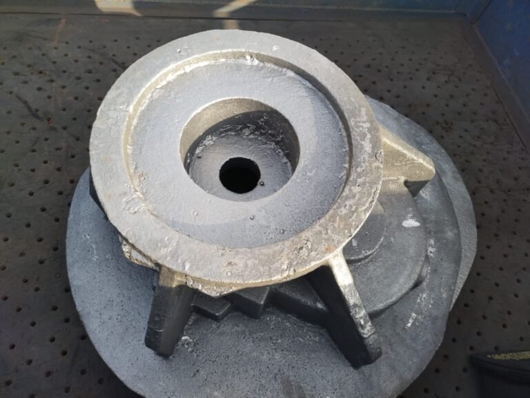 Machined iron casting with a centre bore