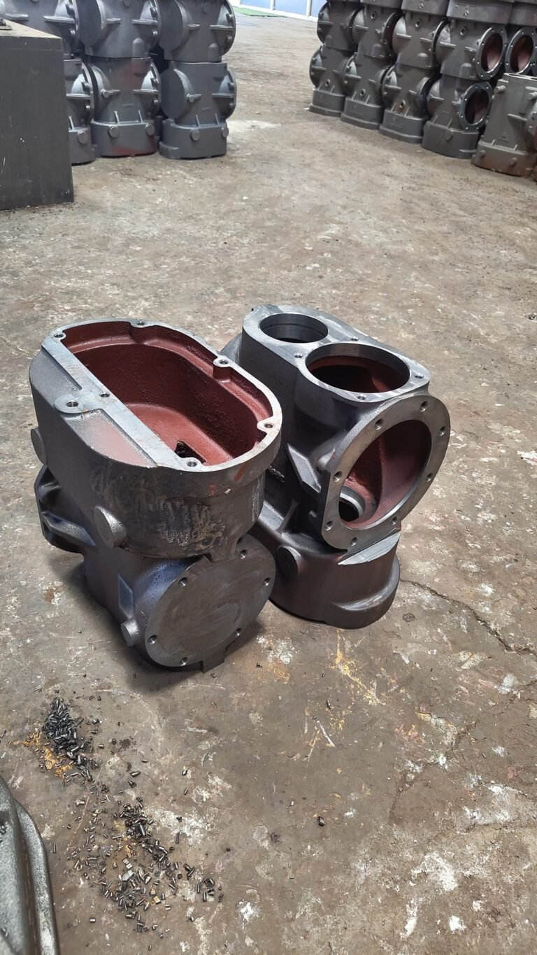 Machined valve body castings in red primer