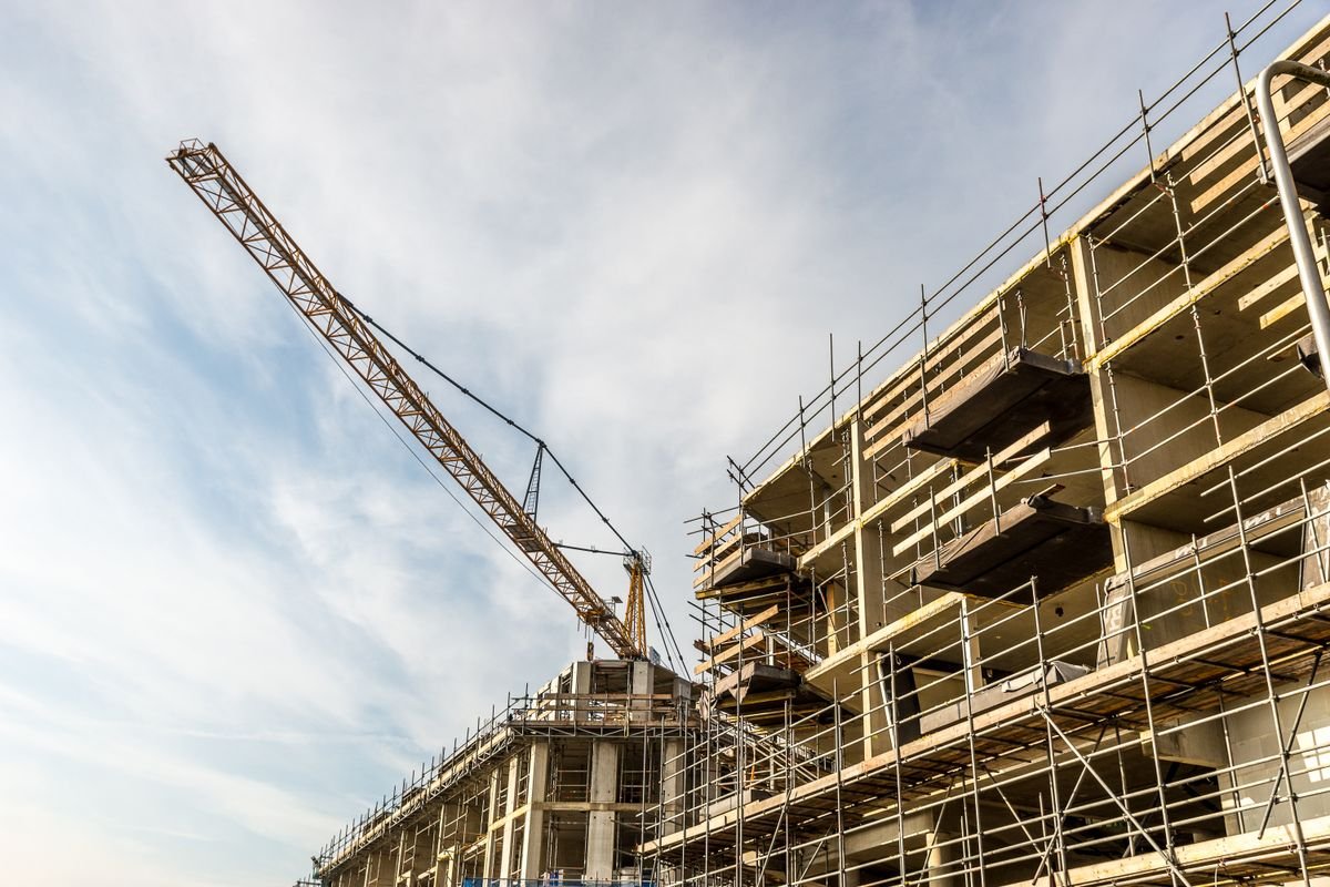 Tower crane and scaffolding on a building construction site
