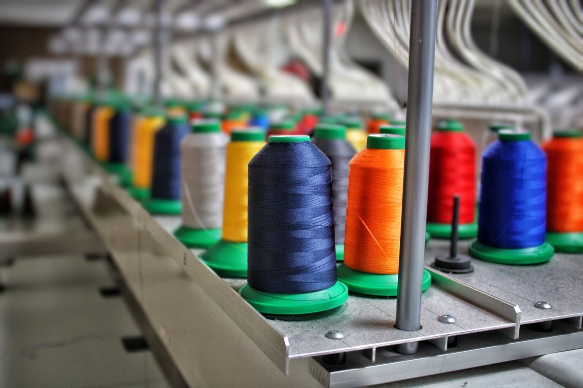 Thread spools on an industrial textile machine